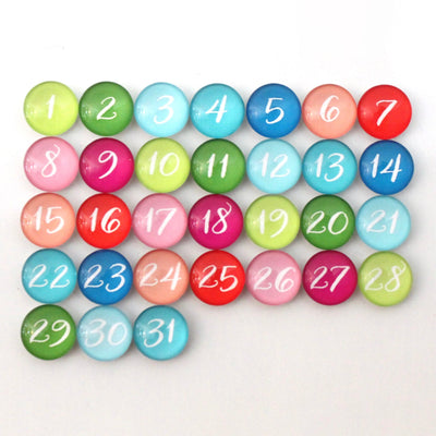 CalendarGirlCompanys 9 X 24 Framed Weekly Chalkboard Calendar (#920) features a vivid grid of colorful numbered magnets (1-31) in green, blue, pink, orange, and red that stand out against a stark white backdrop.
