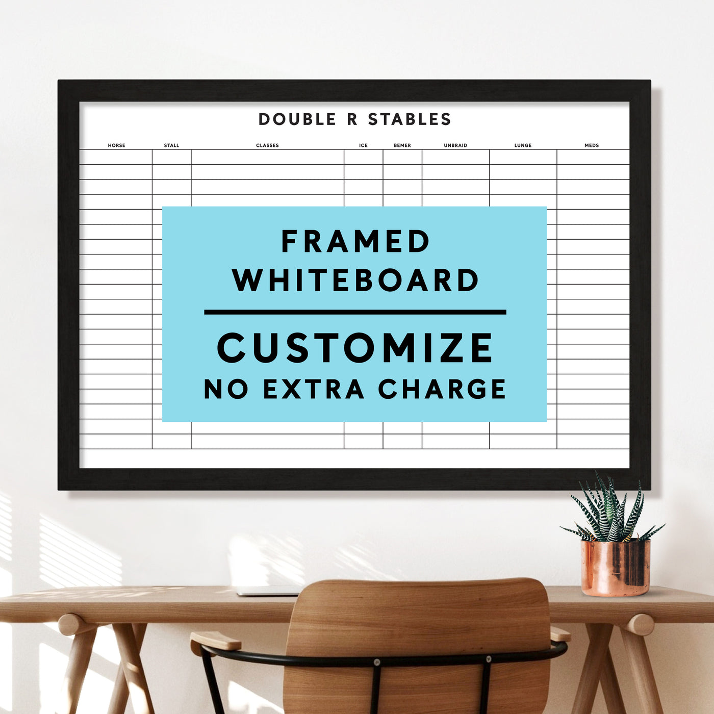 A premium Girl Friday equestrian dry erase whiteboard at Double R Stables features customizable columns for horse details. Nearby, a desk with a chair and potted plant sets the scene. A blue rectangle reads, Framed Whiteboard Customize No Extra Charge, showcasing an elegant solution.