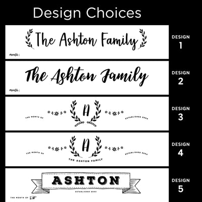 Image depicting five design choices for family name prints on a premium acrylic surface: Designs 1 and 2 with The Ashton Family in cursive, designs 3 and 4 with The Month of and Established 2008, and design 5 featuring Ashton in bold block letters with a ribbon banner—by CalendarGirlCompany.
