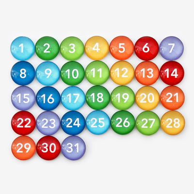 CalendarGirlCompanys 24 x 36 Large Vertical Chalkboard (24132) features colorful, numbered circular magnets in a gradient of blue, green, yellow, red, and purple that transform the board into an organized calendar against its light gray background.