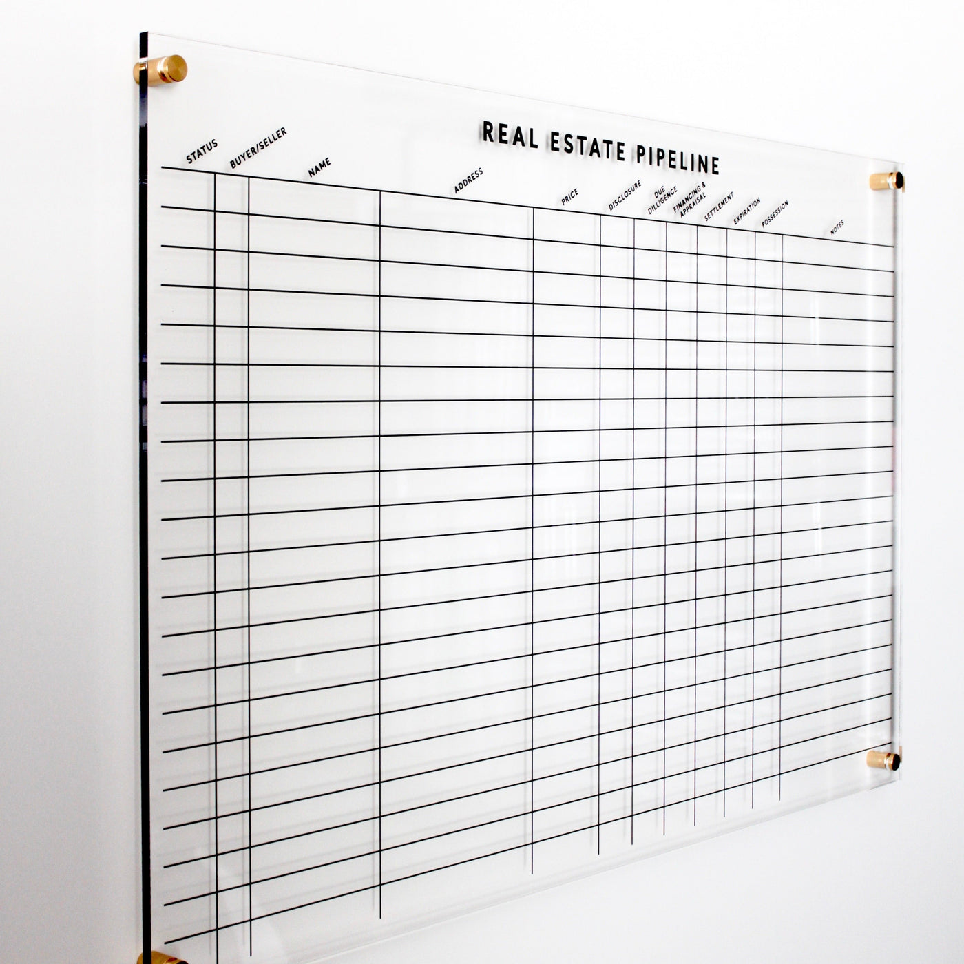 The Girl Friday Real Estate Pipeline Acrylic Board is a wall-mounted, clear board customized for real estate tracking. REAL ESTATE PIPELINE tops it, including columns for status, name, and details. Its rows are perfect for managing deals using wet-erase markers.
