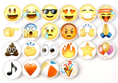 Girl Fridays Emoji magnets feature a grid of emoji buttons including smiley faces, heart eyes, and tongue-out icons. Motivational emojis like clapping and fire are included, along with side-eye, confetti, and stars—perfect to brighten up any space.