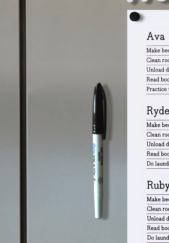 A Girl Friday Make any marker magnetic! product, in black and white, uses a thin magnet to cling to metal surfaces. A partially visible list shows names and tasks like making a bed and unloading the dishwasher.